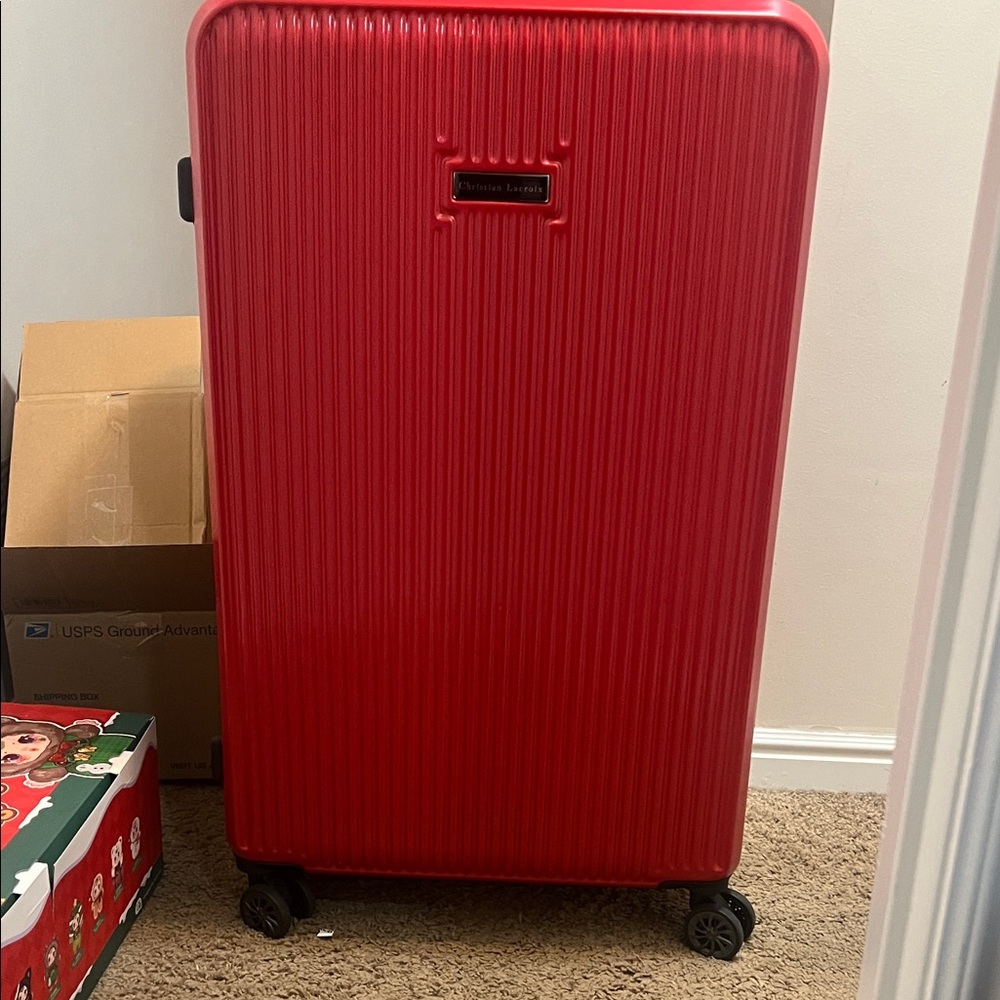 Textured Red roller Suitcase